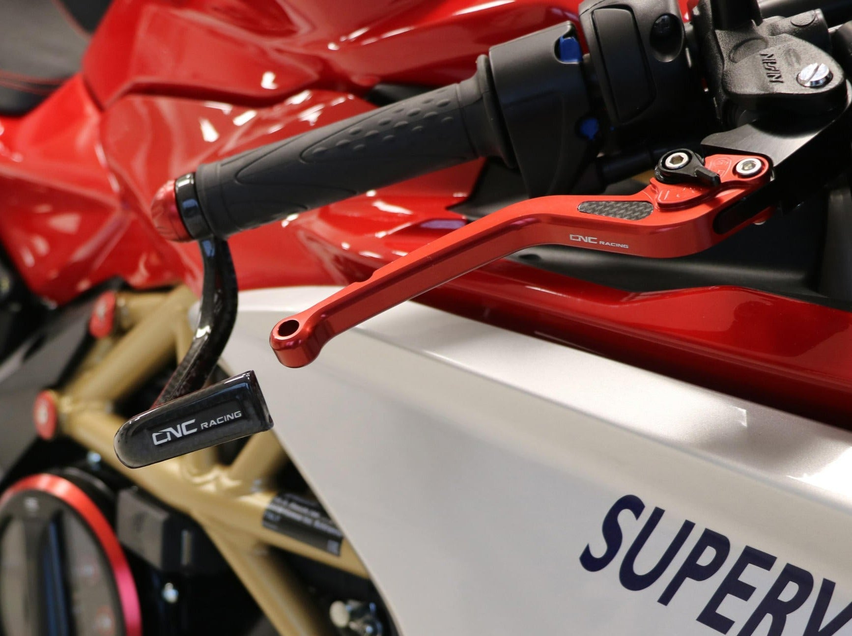 PL150 - CNC RACING Yamaha Carbon Racing Brake Lever Guard (including adapter) – Accessories in the Motodeal Motorcycle Aftermarket Accessories and Parts Online Shop