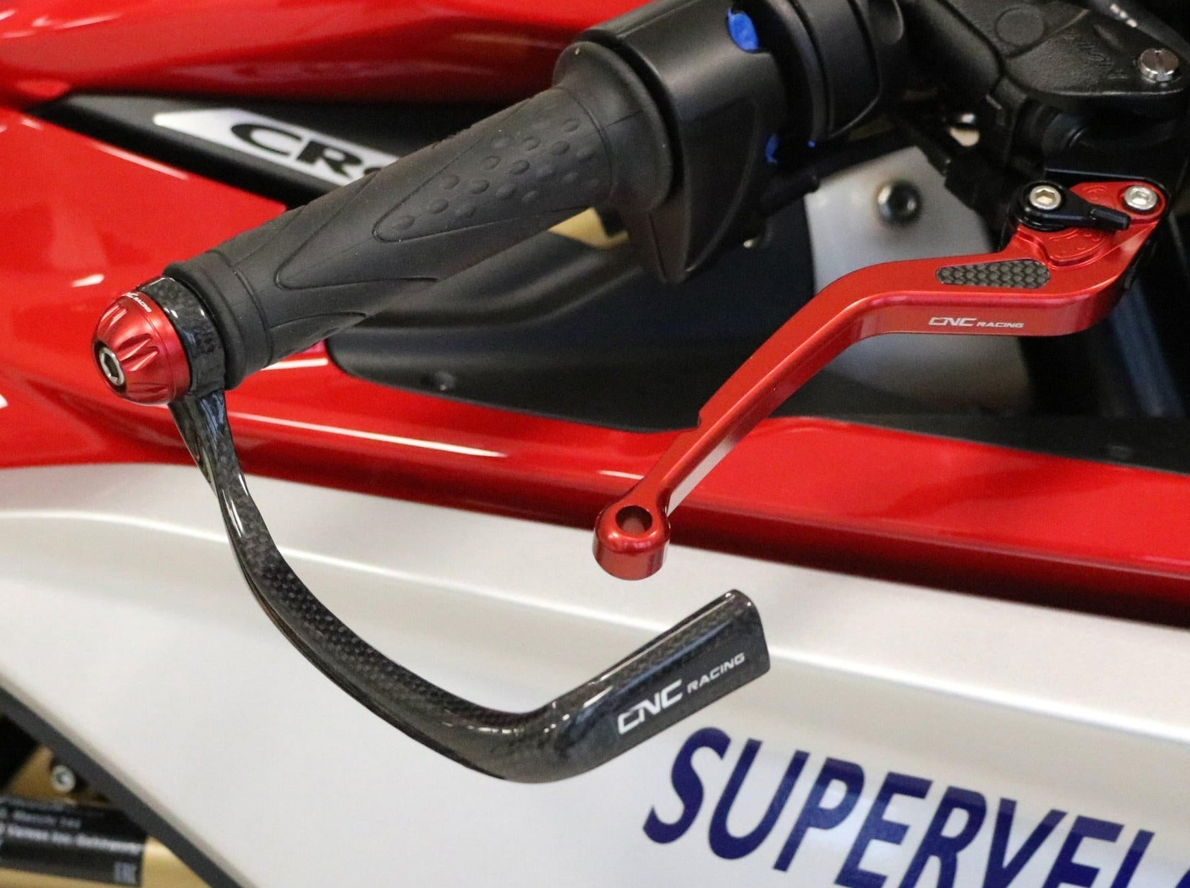 PL150 - CNC RACING Yamaha Carbon Racing Brake Lever Guard (including adapter) – Accessories in the Motodeal Motorcycle Aftermarket Accessories and Parts Online Shop