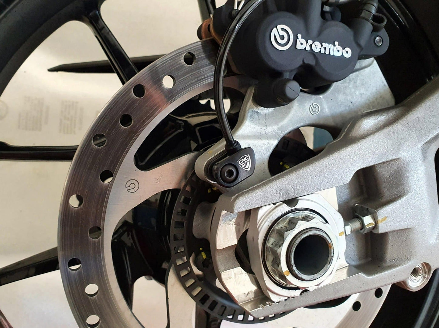 PR201 - CNC RACING Ducati Steel ABS Sensor Protection – Accessories in the Motodeal Motorcycle Aftermarket Accessories and Parts Online Shop