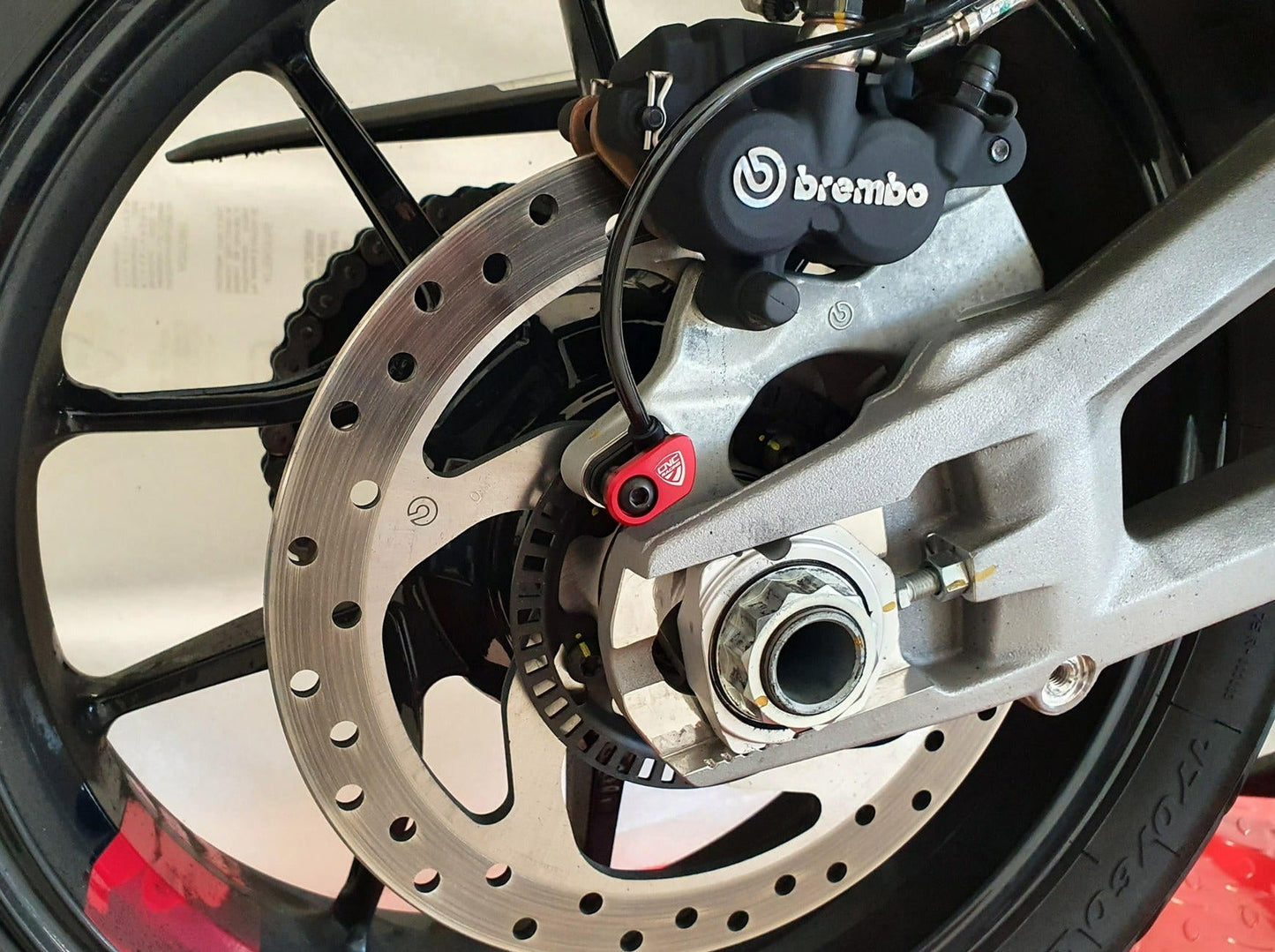 PR201 - CNC RACING Ducati Steel ABS Sensor Protection – Accessories in the Motodeal Motorcycle Aftermarket Accessories and Parts Online Shop