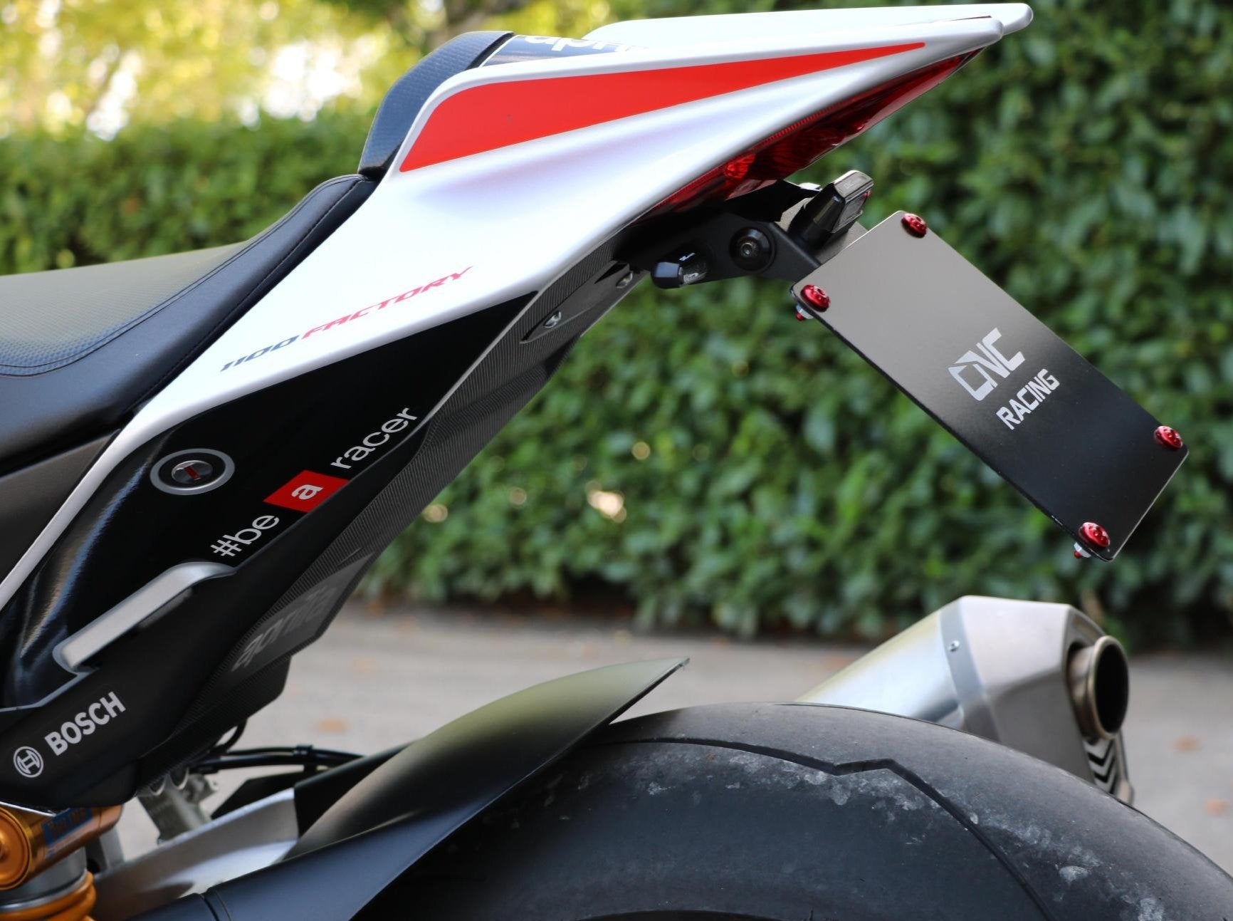 PT103 - CNC RACING Aprilia RSV4 / Tuono V4 (09/20) Adjustable LED License Plate Holder – Accessories in the Motodeal Motorcycle Aftermarket Accessories and Parts Online Shop