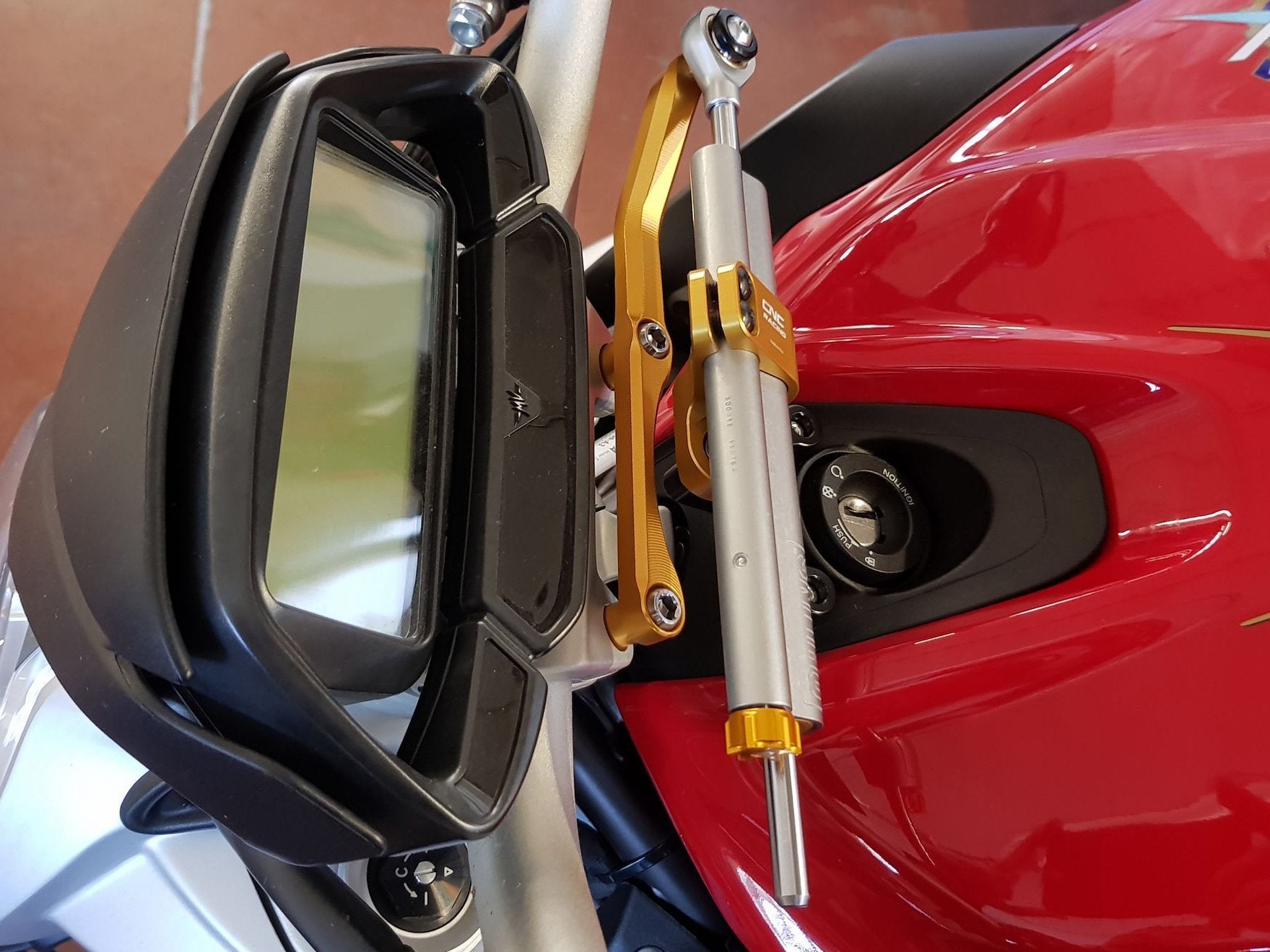MV Agusta Brutale 800 (2016+) OHLINS Steering Damper + CNC RACING Mounting Kit – Accessories in the Motodeal Motorcycle Aftermarket Accessories and Parts Online Shop