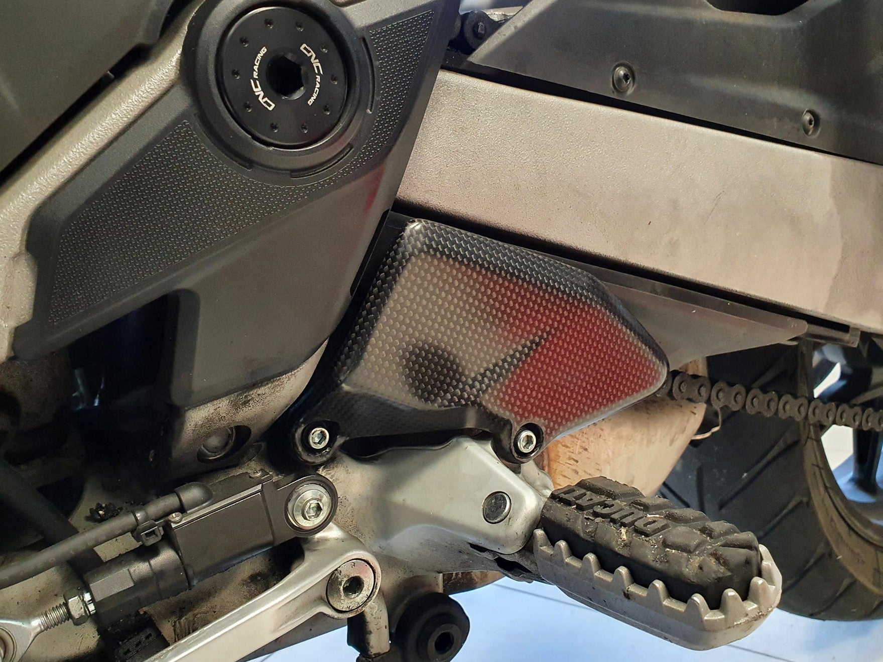 ZA992 - CNC RACING Ducati Multistrada V4 (2021+) Carbon Heel Guards – Accessories in the Motodeal Motorcycle Aftermarket Accessories and Parts Online Shop