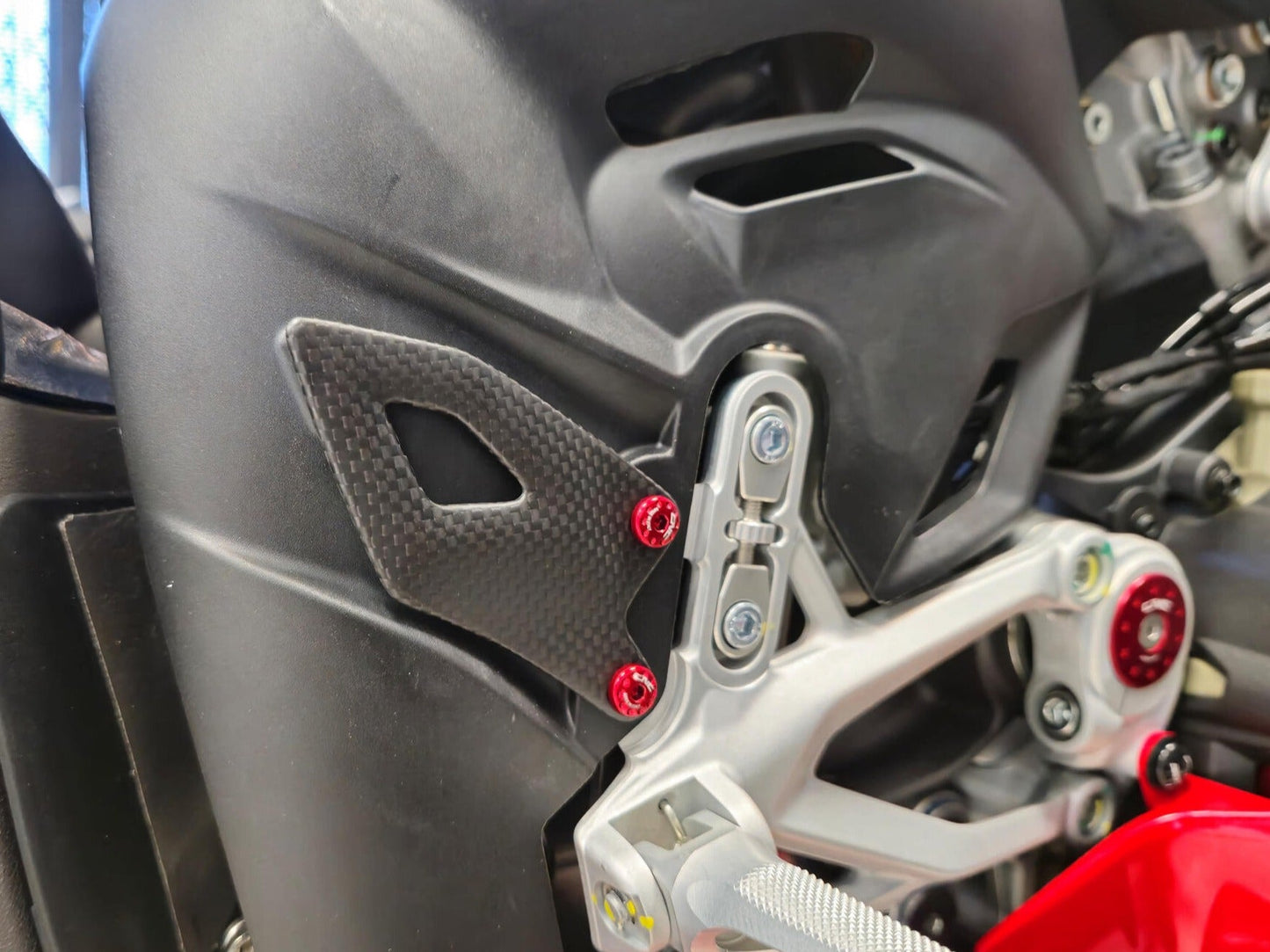 CNC RACING ZA412 Ducati Panigale V4 (2025+) Carbon Heel Guard Kit – Accessories in the Motodeal Motorcycle Aftermarket Accessories and Parts Online Shop