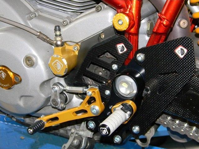 RPPC04 - DUCABIKE Ducati Multistrada / Hypermotard Carbon Pilot Heel Guards – Accessories in the Motodeal Motorcycle Aftermarket Accessories and Parts Online Shop