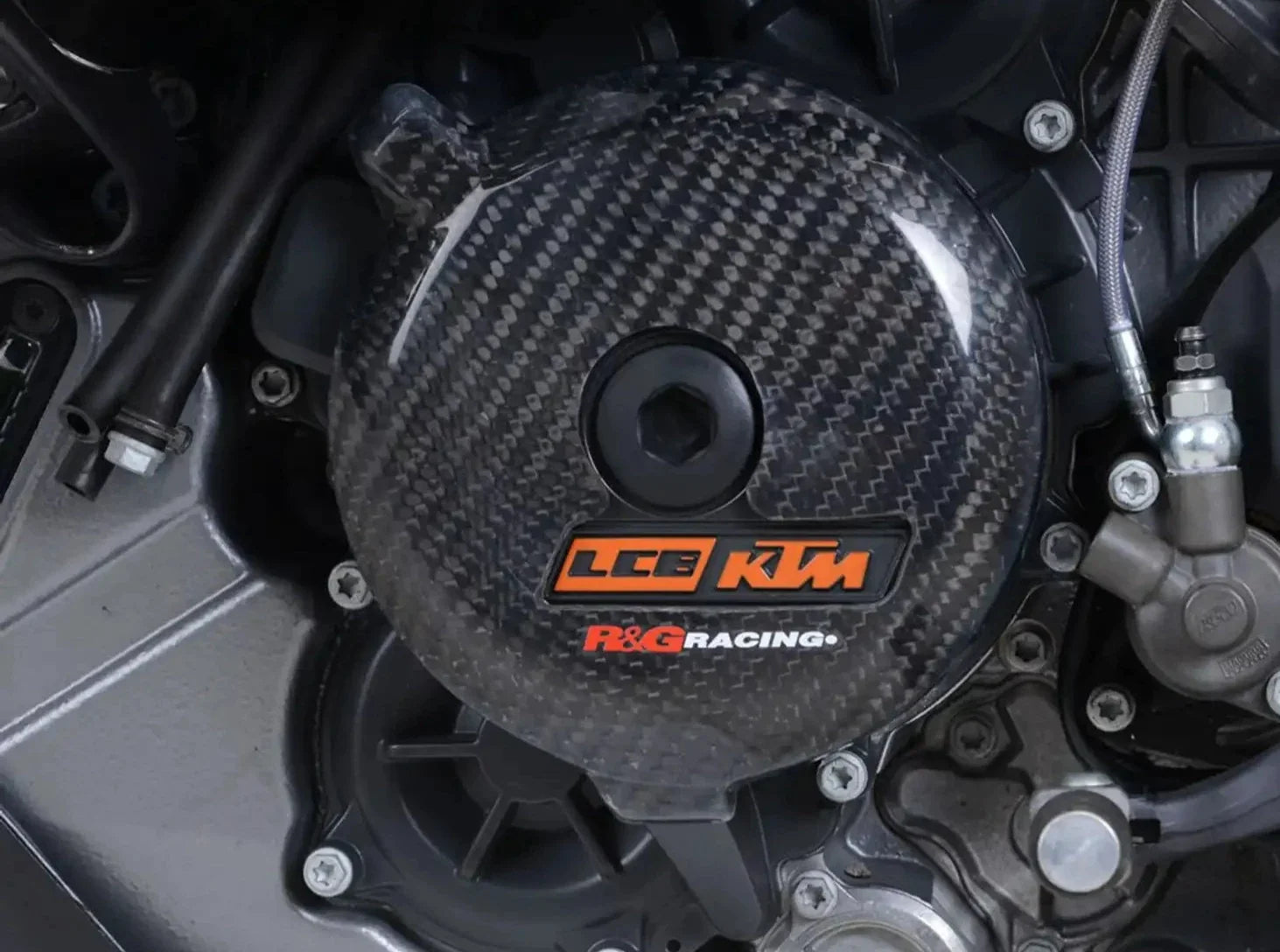 ECS0102 - R&G RACING KTM 1050 / 1290 Super Adventure / Super Duke Carbon Engine Case Slider (left) – Accessories in the 2WheelsHero Motorcycle Aftermarket Accessories and Parts Online Shop